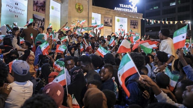 Residents of Hargeis waving Somaliland flags gathered to celebrate Israel's announcement
