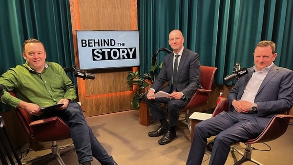Fran McNulty siting in the Behind the Story podcast studio with David Murphy and Brian O'Donovan