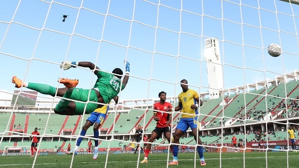 Gabon's goalkeeper #23 Loyce Mbaba concedes a goal during the Africa Cup of Nations (CAN) Group F football match between Gabon and Mozambique at Grand Stadium in Agadir on December 28, 2025. (Photo by FRANCK FIFE / AFP)