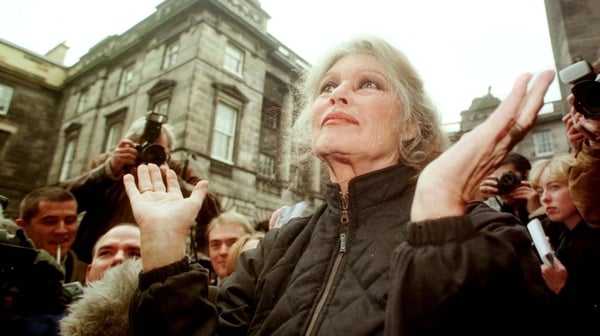 French movie legend turned animal rights campaigner Brigitte Bardot celebrates outside Edinburghs High court after Woofie the condemmed dog was saved from Death Row. Photo by David Cheskin/PA