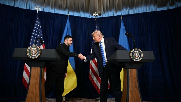 US President Donald Trump and Ukranian President Volodymyr Zelensky shake hands during a press conference following talks at Trump's Mar-a-Lago residence in Palm Beach, Florida