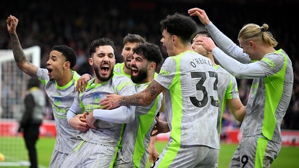 Rayan Cherki of Manchester City celebrates with teammates after scoring his team's second goal during the Premier League match between Nottingham Forest and Manchester City at City Ground on December 27, 2025 in Nottingham, England.