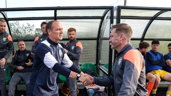 16 May 2025; Kerry manager Colin Healy, left, shakes hands with Wexford manager Stephen Elliott before the SSE Airtricity Men's First Division match between Kerry and Wexford at Mounthawk Park in Tralee, Kerry. Photo by Michael P Ryan/Sportsfile