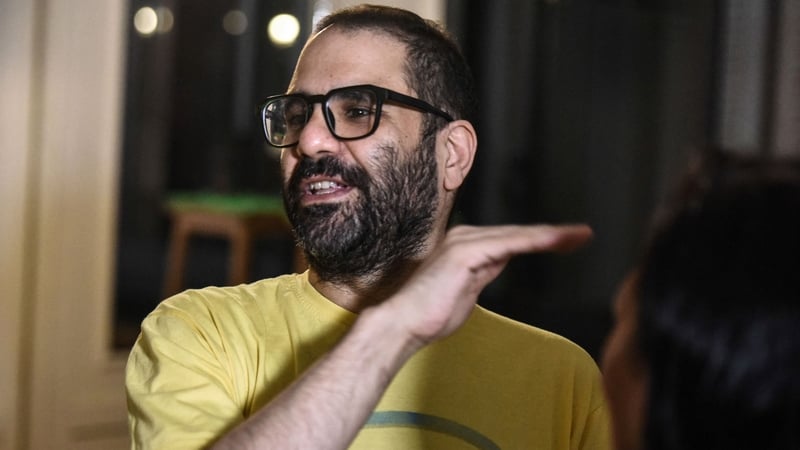 Alaa Abdel Fattah celebrates after his release in Cairo