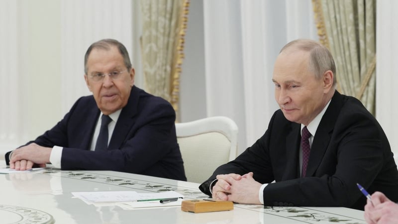 Sergei Lavrov (L) said Ukraine tried to attack the Novgorod residence of Vladimir Putin (R) (file image)