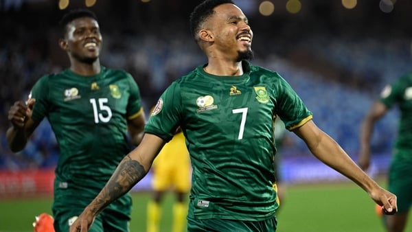South Africa's midfielder #07 Oswin Appollis celebrates scoring the team's third goal from a penalty during the Africa Cup of Nations