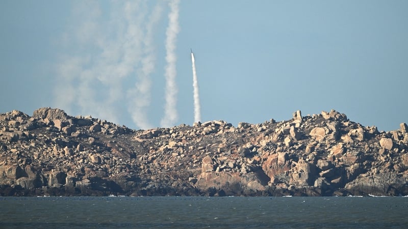 Chinese PLA soldiers fire rockets as they conducted military drills on Pingtan island close to Taiwan