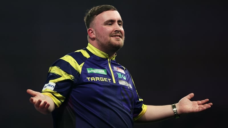 Luke Littler reacts during his victory over Rob Cross