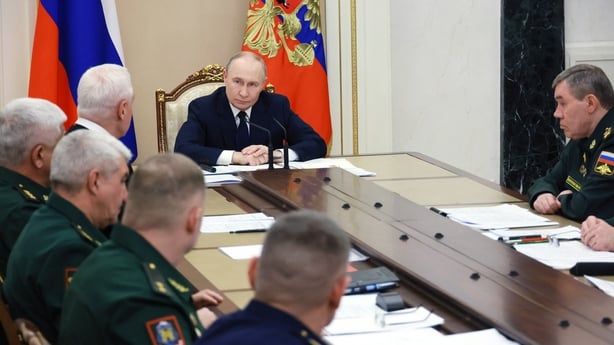 In this pool photograph distributed by the Russian state agency Sputnik, Russia's President Vladimir Putin chairs a meeting on situation in the zone of the "special military operation", the Kremlin's term for the nearly four-year-long Ukraine offensive, in Moscow on December 29, 2025. (Photo by Mikh
