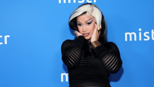 Cardi B poses for a photo on the red carpet