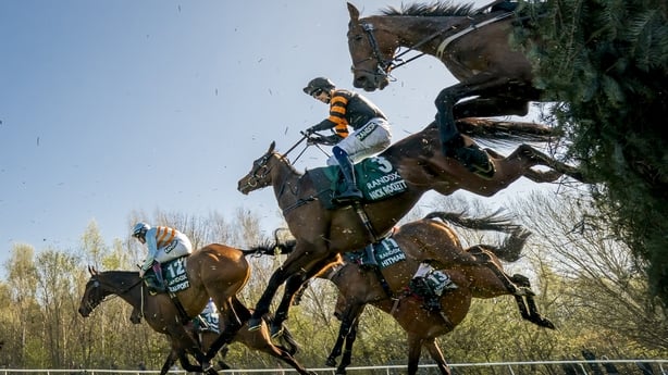 Nick Rockett ridden by Patrick Mullins (centre) on their way to winning the 2025 Aintree Grand National