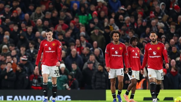 (L-R) Benjamin Sesko, Joshua Zirkzee and Matheus Cunha of Manchester United look dejected after Wolves score equaliser in Premier League match, December 2025