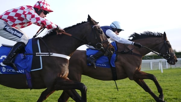 CHELTENHAM, ENGLAND - JANUARY 01: Harry Skelton riding Kabral Du Mathan (blue/white) clear the last to win The Dornan Engineering Relkeel Hurdleat Cheltenham Racecourse on January 01, 2026 in Cheltenham, England. (Photo by Alan Crowhurst/Getty Images)