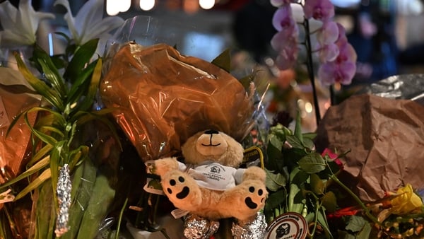 CRANS-MONTANA, SWITZERLAND - JANUARY 01: Flowers, candles and notes are laid after a fire broke out overnight at Le Constellation bar on January 01, 2026 in Crans-Montana, Switzerland. According to authorities, the fire began around 1:30 AM local time, wi