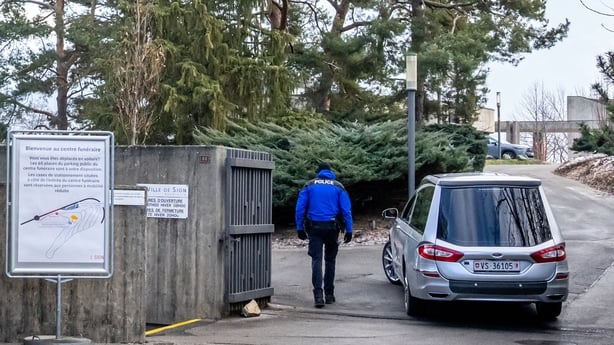 A hearse arrives at the funeral home in Sion 