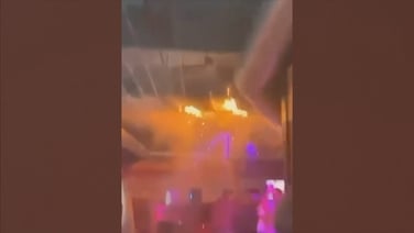 Video shows person attempting to put out first flames of fire