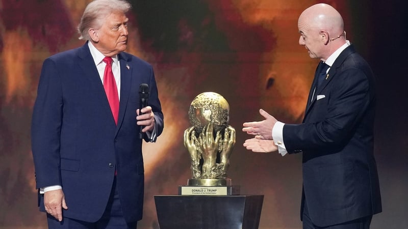 Donald Trump receives the FIFA Peace Prize from Gianni Infantino