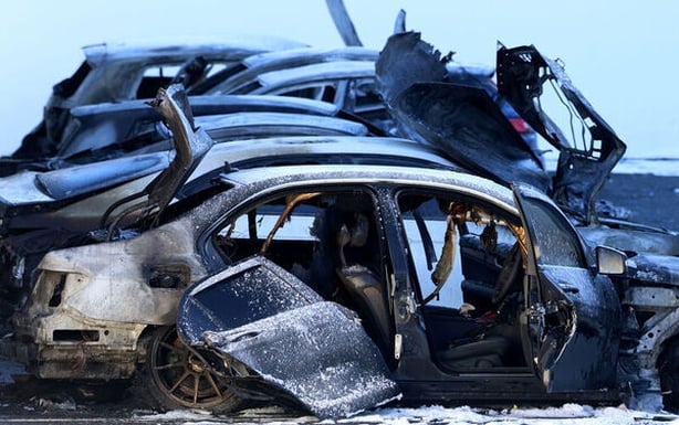 A row of burnt cars