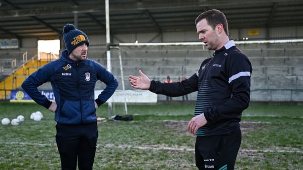 Referee Kevin Williamson and Westmeath manager Mark McHugh