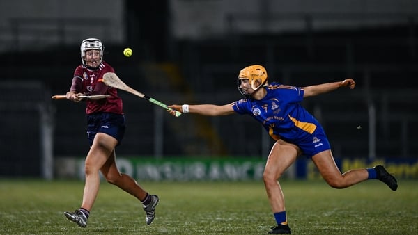 Lisa Casserly of Athenry is tackled by Sofia Daly of St Finbarr’s during the AIB All-Ireland Camogie Senior Club Championship final replay match between Athenry of Galway and St Finbarr's of Cork at FBD Semple Stadium in Thurles, Tipperary. Photo by Ben M
