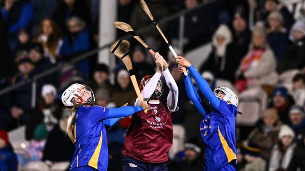 3 January 2026; Therese Donohue of Athenry contests a high-ball against Kate Wall, left, and Gráinne Cahalane of St Finbarr's during the AIB All-Ireland Camogie Senior Club Championship final replay match between Athenry of Galway and St Finbarr's of Cork at FBD Semple Stadium in Thurles, Tipperary.