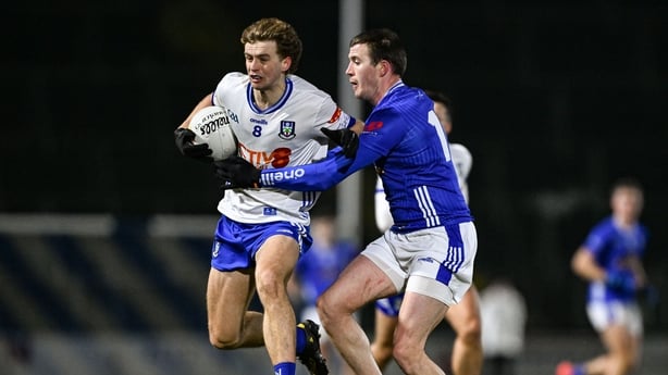 3 January 2026; Karl Gallagher of Monaghan in action against Ciaran Brady of Cavan during the Bank of Ireland Dr McKenna Cup match between Cavan and Monaghan at Kingspan Breffni in Cavan. Photo by Ramsey Cardy/Sportsfile