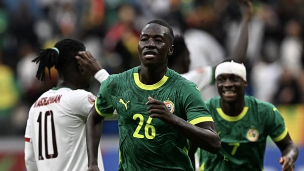 Pape Gueye celebrates scoring his team's second goal during the Africa Cup of Nations (CAN) round of 16 football match between Senegal and Sudan at Grand Stadium in Tangiers 