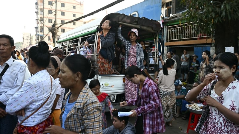 Relatives wait for prisoners to be released during an annual amnesty to mark Myanmar's independence day outside Insein prison in Yangon