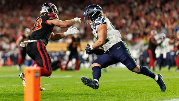 SANTA CLARA, CALIFORNIA - JANUARY 3: Drake Thomas #42 of the Seattle Seahawks intercepts a pass intended for Christian McCaffrey #23 of the San Francisco 49ers during the fourth quarter of an NFL football game at Levi's Stadium on January 03, 2026 in Sant