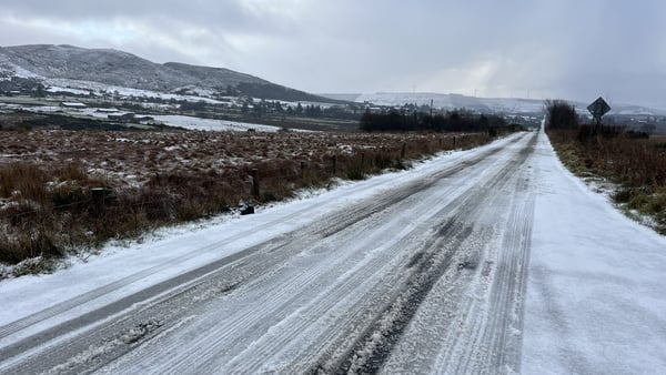 Road covered in light snow