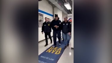 Maduro walks hallway at US Drug Enforcement Administration