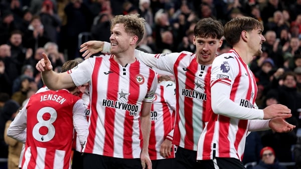 Nathan Collins of Brentford celebrates scoring his team's second goal with teammates during the Premier League match between Everton and Brentford at Hill Dickinson Stadium on January 04, 2026 in Liverpool, England.