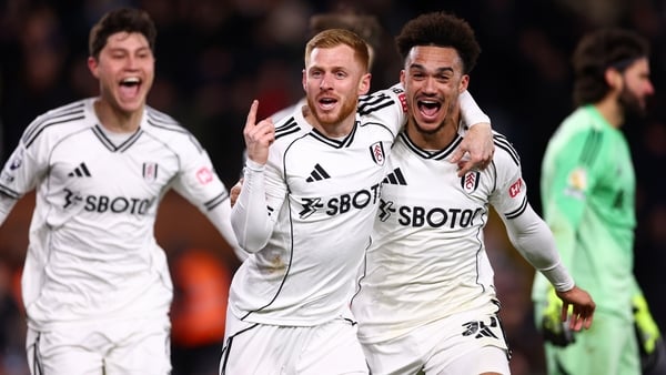 Harrison Reed of Fulham celebrates scoring his team's second goal with teammate Antonee Robinson
