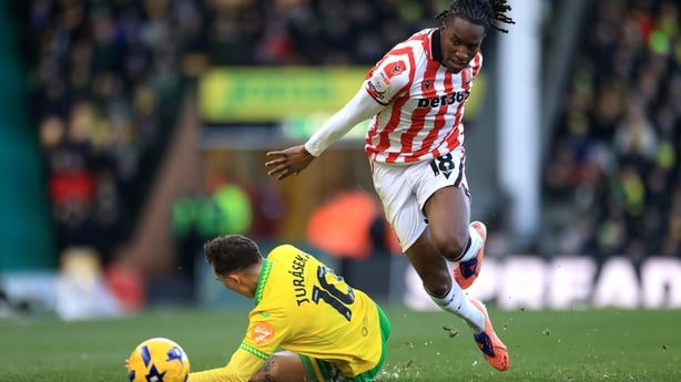 Bosun Lawal of Stoke City and Matej Jurasek of Norwich City battle for possession during the Sky Bet Championship match between Norwich City and Stoke City at Carrow Road on January 04, 2026 in Norwich, England.