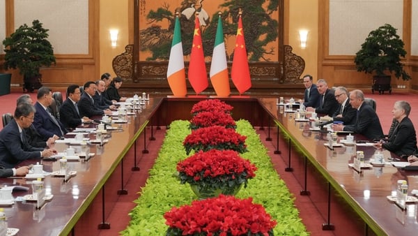 Ireland's Prime Minister Micheal Martin (2nd R) talks to China's President Xi Jinping (3rd L) during a bilateral meeting at the Great Hall of the People in Beijing on January 5, 2026. (Photo by Andy Wong / POOL / AFP)