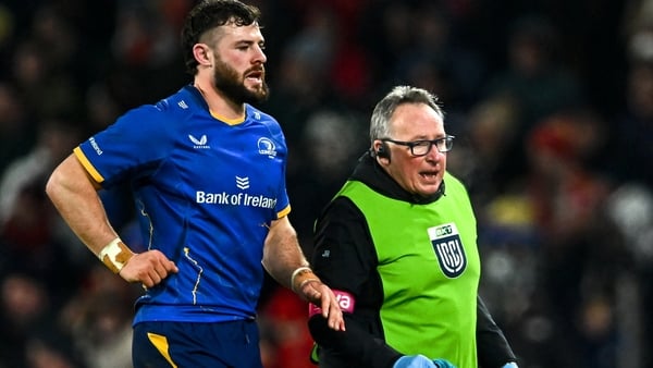 27 December 2025; Robbie Henshaw of Leinster leaves the pitch to receive medical attention for an injury during the United Rugby Championship match between Munster and Leinster at Thomond Park in Limerick. Photo by Piaras Ó Mídheach/Sportsfile