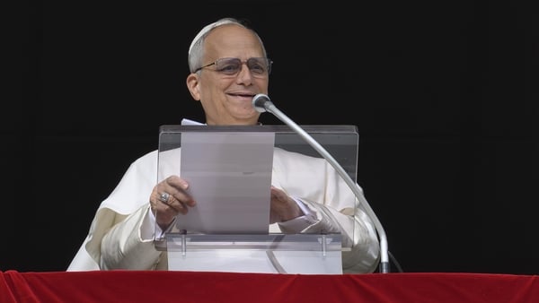 VATICAN CITY, VATICAN - JANUARY 04: (EDITOR NOTE: STRICTLY EDITORIAL USE ONLY - NO MERCHANDISING). Pope Leo XIV delivers his Sunday Angelus blessing from the window of his studio overlooking St. Peter's Square on January 04, 2026 in Vatican City, Vatican.