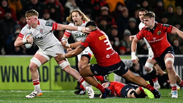 2 January 2026; Bryn Ward of Ulster is tackled by Michael Ala'alatoa of Munster during the United Rugby Championship match between Ulster and Munster at Affidea Stadium in Belfast. Photo by Ramsey Cardy/Sportsfile