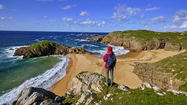 A man standing on a cliff in Donegal