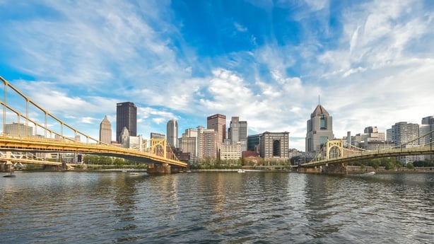 Roberto Clemente bridge (right) and Andy Warhol bridge (left) spanning over the Allegheny river with Pittsburgh skyline on background right before sunset, Pennsylvania, USA