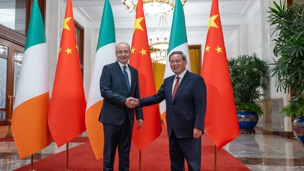 Taoiseach Micheal Martin shaking hands with China's Premier Li
