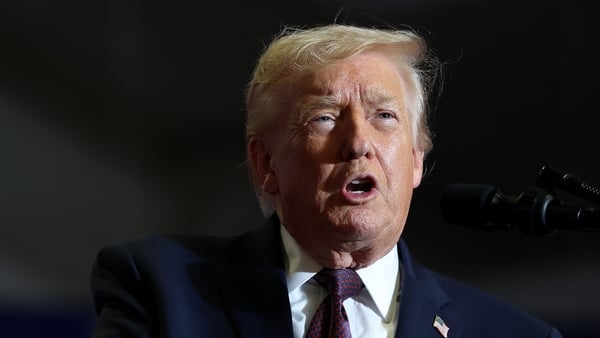 ROCKY MOUNT, NORTH CAROLINA - DECEMBER 19: U.S. President Donald Trump delivers remarks during a rally at the Rocky Mount Event Center on December 19, 2025 in Rocky Mount, North Carolina. Trump spoke on his plans to lower the cost of staples, including ga