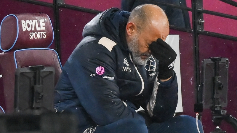 Nuno Espirito Santo, manager of West Ham United, sits on the bench after a penalty is awarded to Nottingham Forest