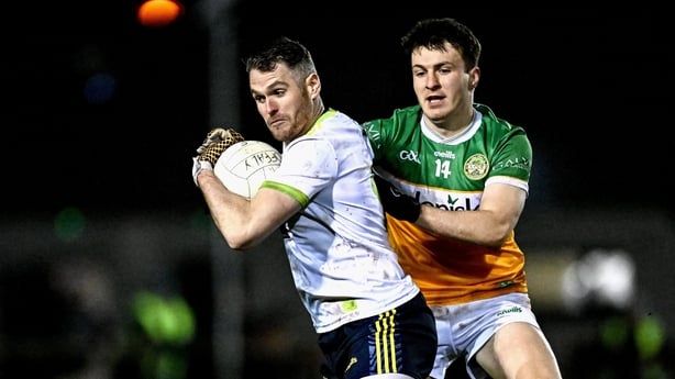 Bryan Menton of Meath in action against Diarmuid Egan of Offaly during the Dioralyte O'Byrne Cup quarter-final match between Offaly and Meath at Gracefield GAA Club in Offaly.