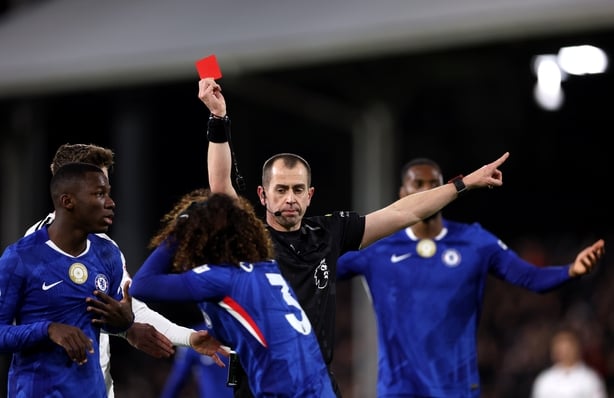 LONDON, ENGLAND - JANUARY 07: Referee Peter Bankes shows a red card to Marc Cucurella of Chelsea during the Premier League match between Fulham and Chelsea at Craven Cottage on January 07, 2026 in London, England. (Photo by Justin Setterfield/Getty Images)