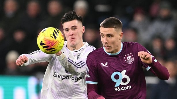 Manchester United's Slovenian striker #30 Benjamin Sesko (L) tangles with Burnley's French defender #05 Maxime Esteve (R) during the English Premier League football match between Burnley and Manchester United at Turf Moor in Burnley, north-west England on January 7, 2026.