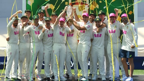 SYDNEY, AUSTRALIA - JANUARY 08: Steve Smith and Pat Cummins of Australia hold up The Ashes trophy after the Fifth Test in the 2025/26 Ashes Series between Australia and England at Sydney Cricket Ground on January 08, 2026 in Sydney, Australia. (Photo by P