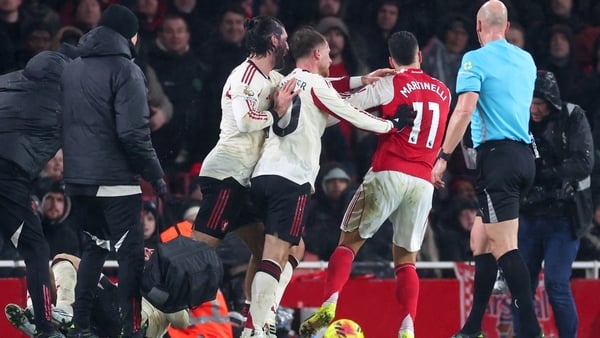 Alexis Mac Allister and Dominik Szoboszlai of Liverpool confront Gabriel Martinelli of Arsenal after he pushes Conor Bradley of Liverpool during the Premier League match between Arsenal and Liverpool at Emirates Stadium on January 8, 2026 in London, Engla