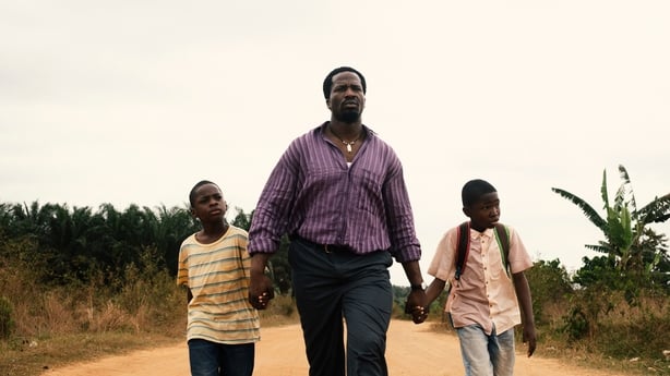 An on-the-road scene from My Father's Shadow