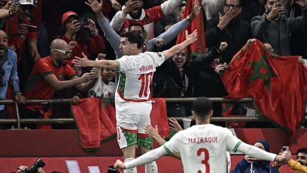 Brahim Diaz (L) celebrates scoring Morocco's first goal during the 2025 Africa Cup of Nations quarter-final clash against Cameroon